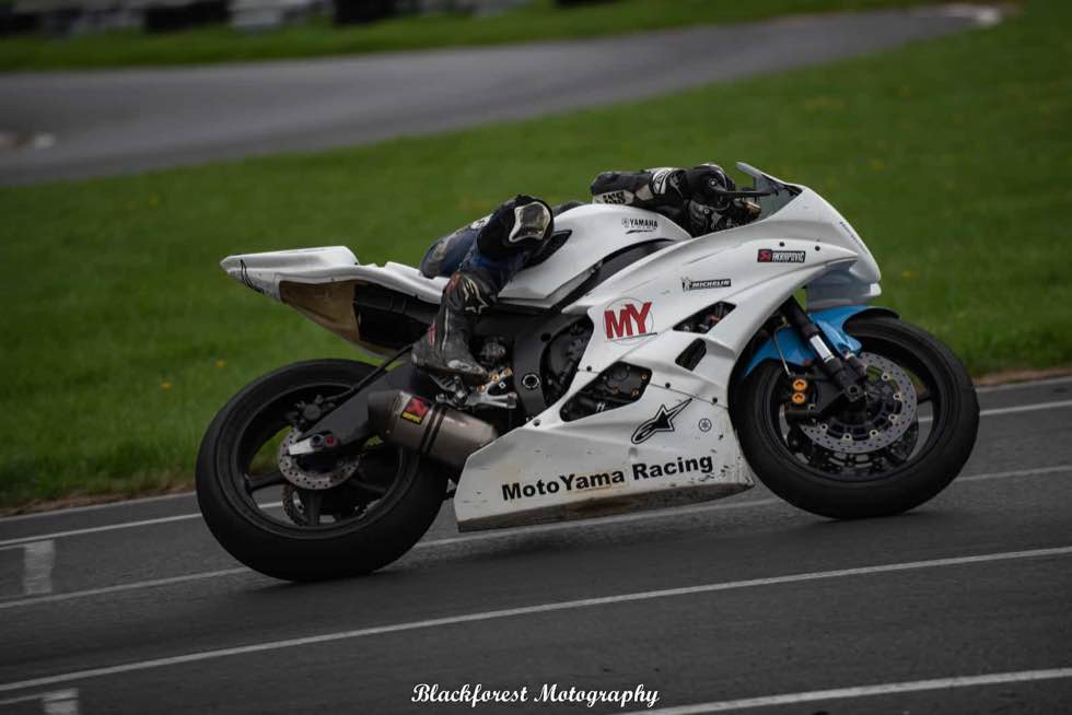 Motorcycle during cornering training on the kart track