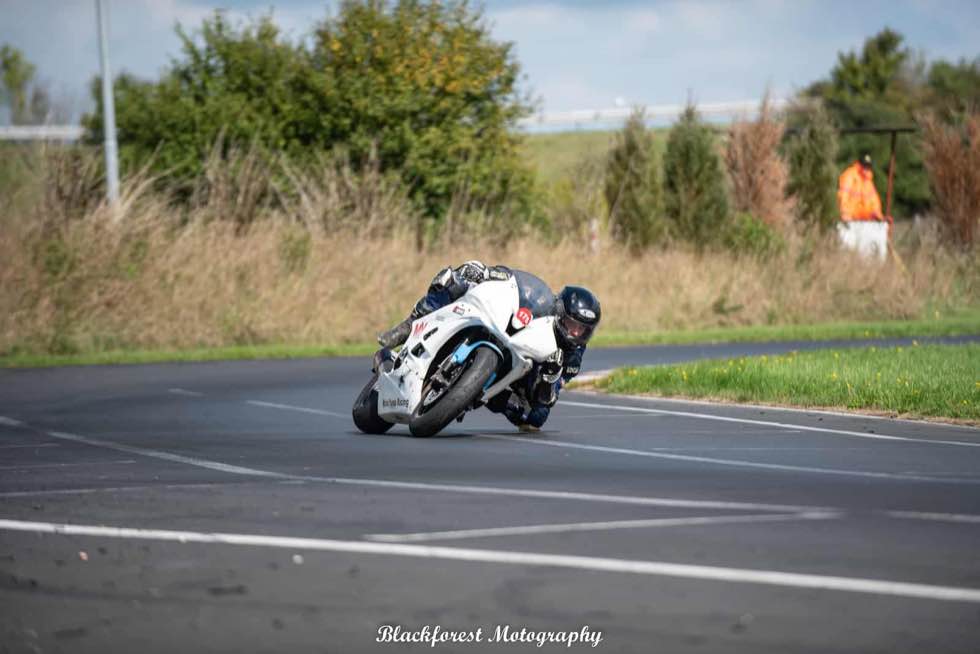 Motorcyclist during cornering training